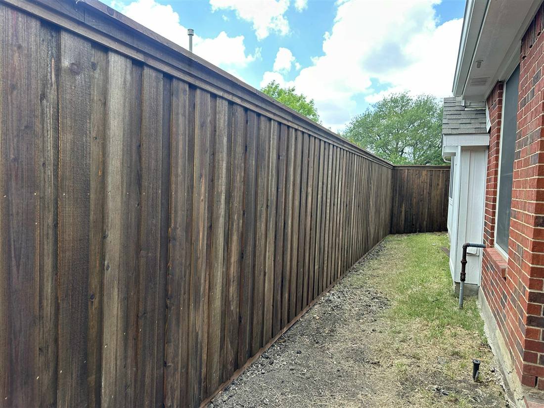 Board-on-board cedar fence in McKinney, TX